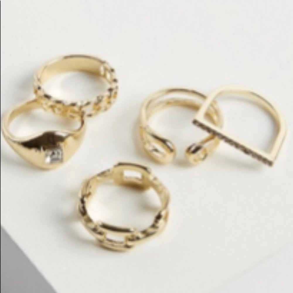 TORRID GOLD RING SET.SIZE 8